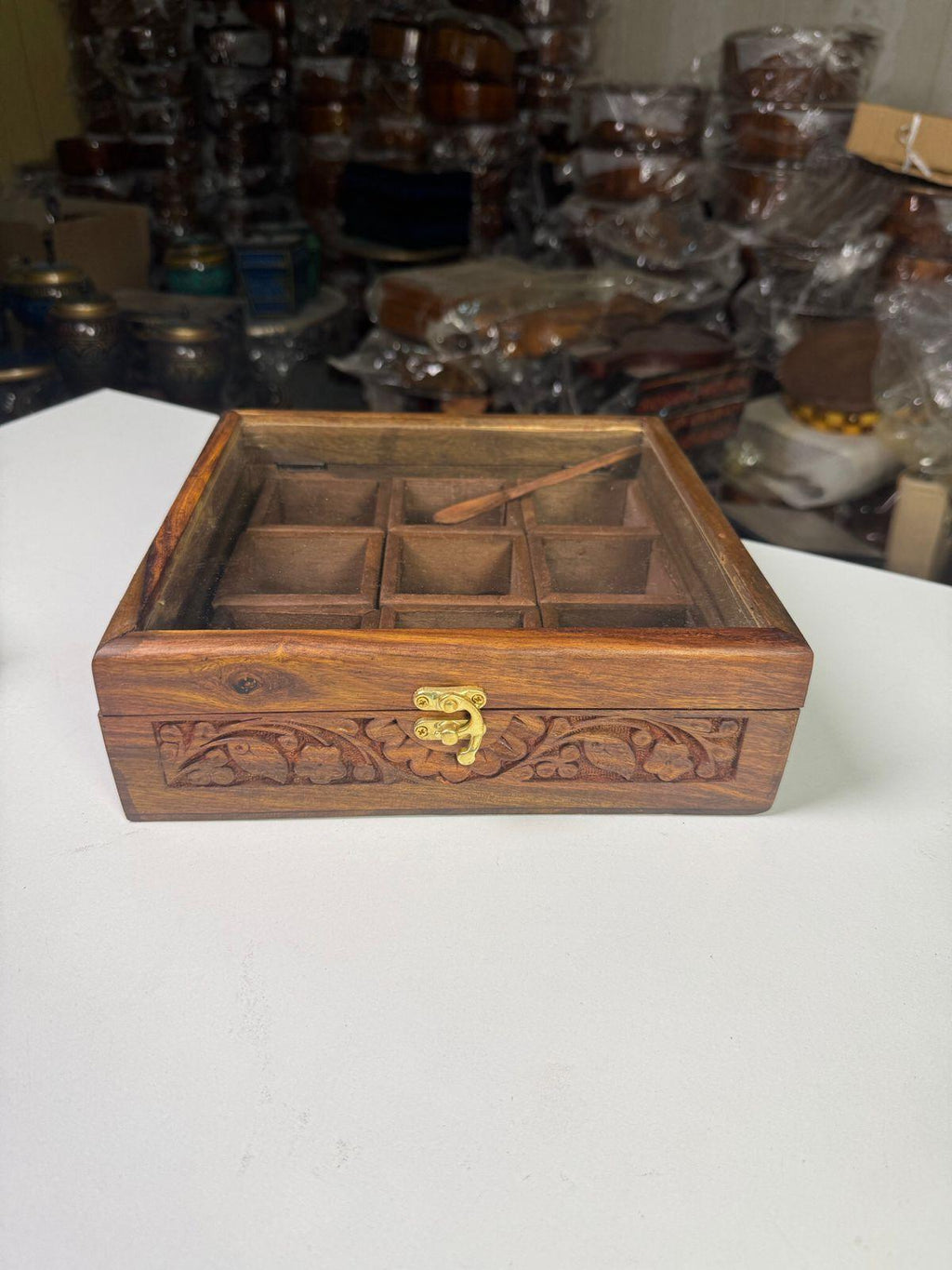Traditional wooden spice storage container